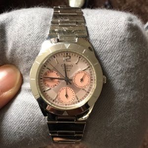 Casio watch with a baby pink dial